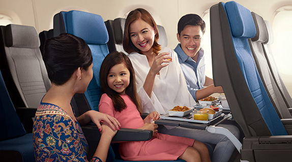 Familia a bordo de Singapore Airlines